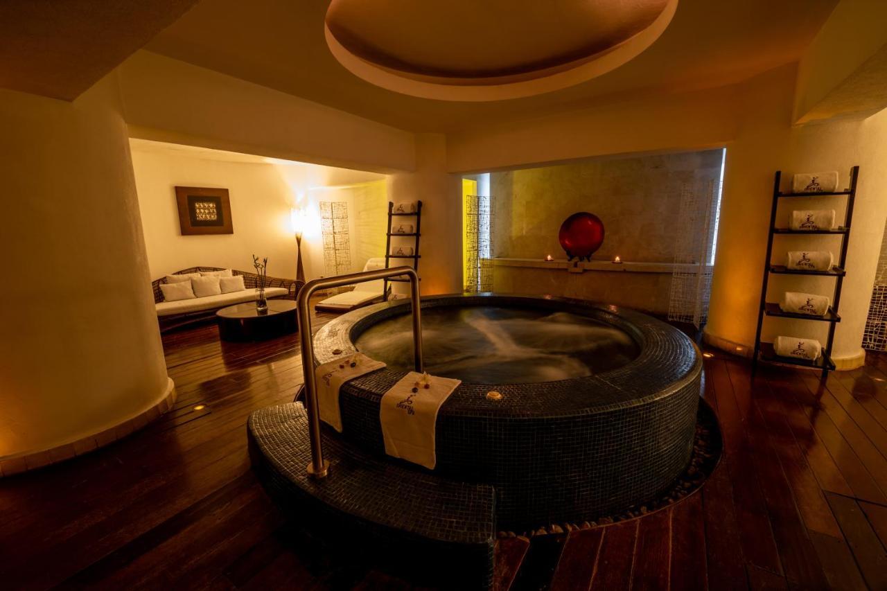 Emporio Acapulco Hotel Exterior foto A whirlpool bath